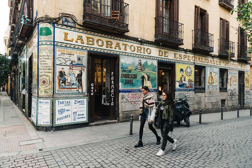 A colourful tiled storefront in Malasaña, a neighbourhood often recommended for travellers wanting to explore Madrid’s trendier local areas.
