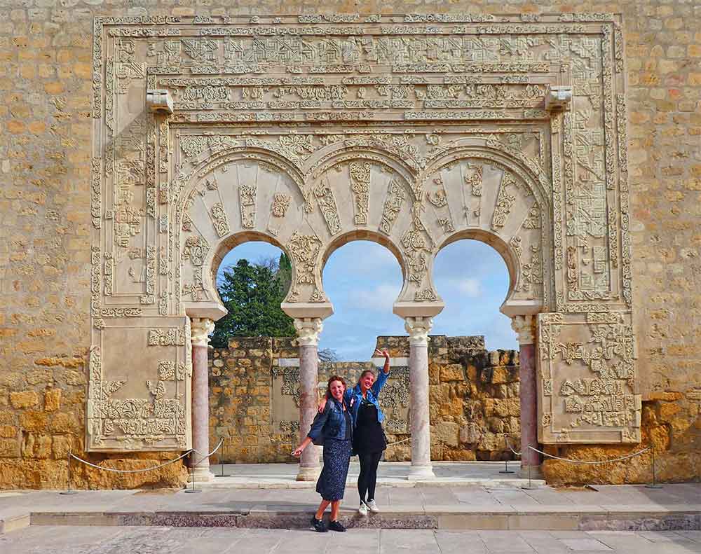 Me and my friend Emily stood under one of the decorative arched walls at the ruins of Medina Azahara. The ruins are located just outside of Cordoba and wroth a visit if you have any extra time on your 2 week Spain and Portugal itinerary. 