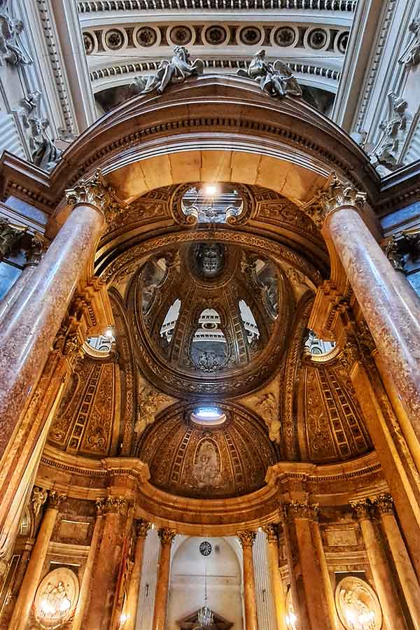 Decorative columns inside the Inside Basilica of Our Lady of the Pillar lookingup into the roof.
