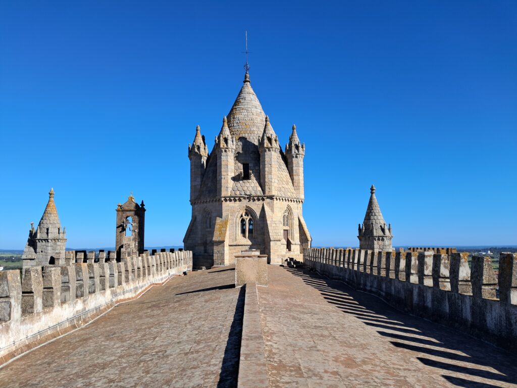 The rooftop turrets at the Cathedral of Evora in Portugal. This was took on a crisp winters morning and has a bright blue sky and sun casting strong shadows.
