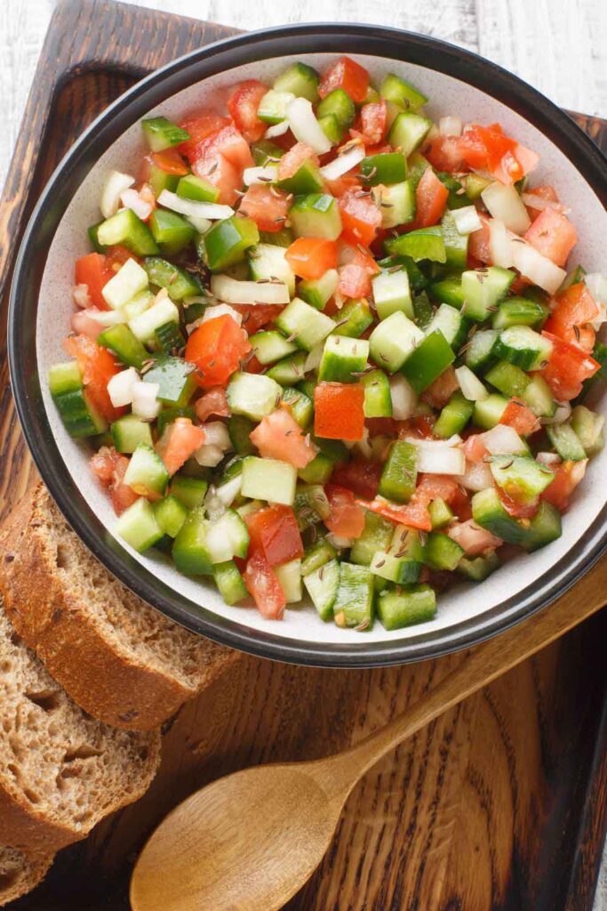 Diced salad of cucumber, tomato, green pepper, and onion served with rustic bread. A fresh and crunchy side dish common in warm-weather Spanish meals.