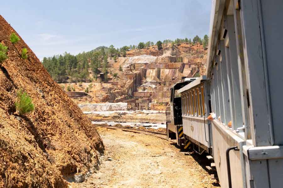 A view looking out of the train driving through the old quarry at the Rio Tinto mines in Huelva.