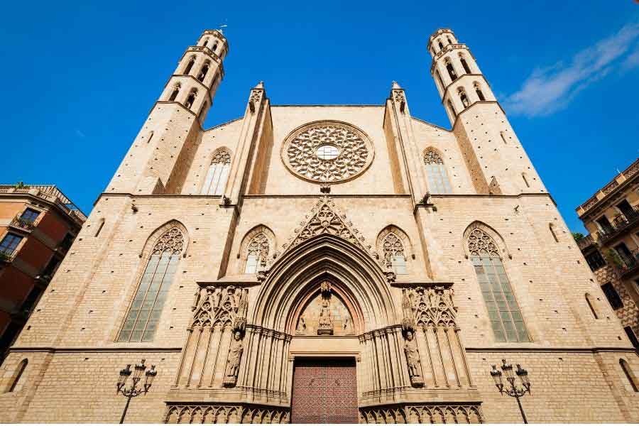 Front view of the Basilica de Santa María del Mar in Barcelona, a fine example of Catalan Gothic architecture with its rose window and twin towers.