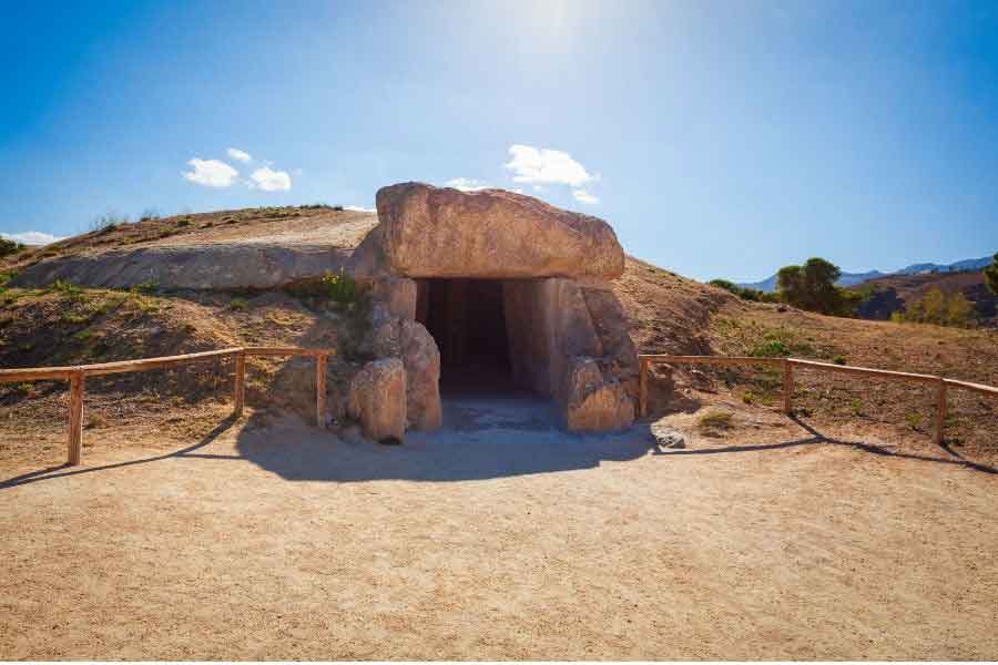 Dolmen de Menga in Antequera, a prehistoric burial mound made of massive stone slabs and one of Spain’s oldest archaeological landmarks.