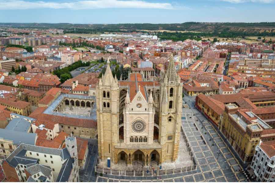 Overhead view of León Cathedral and surrounding plaza, known for its stunning stained glass windows and status as a key stop on the Camino de Santiago.