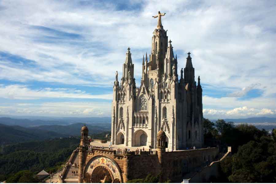 Temple Expiatori del Sagrat Cor on Mount Tibidabo in Barcelona, a striking hilltop basilica crowned with a statue of Christ and panoramic views over the city.