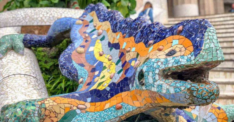 Close-up of the colourful mosaic lizard sculpture in Park Güell, Barcelona—one of the most famous landmarks in Spain, designed by Antoni Gaudí.