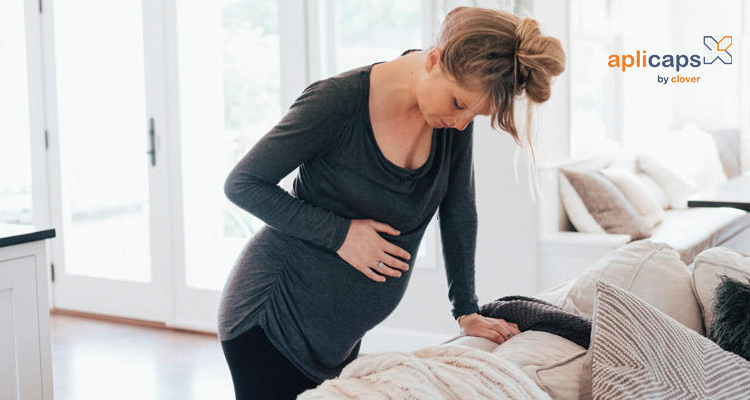 Đau lưng, bị chuột rút ở tuần thai 40 là dấu hiệu sắp sinh