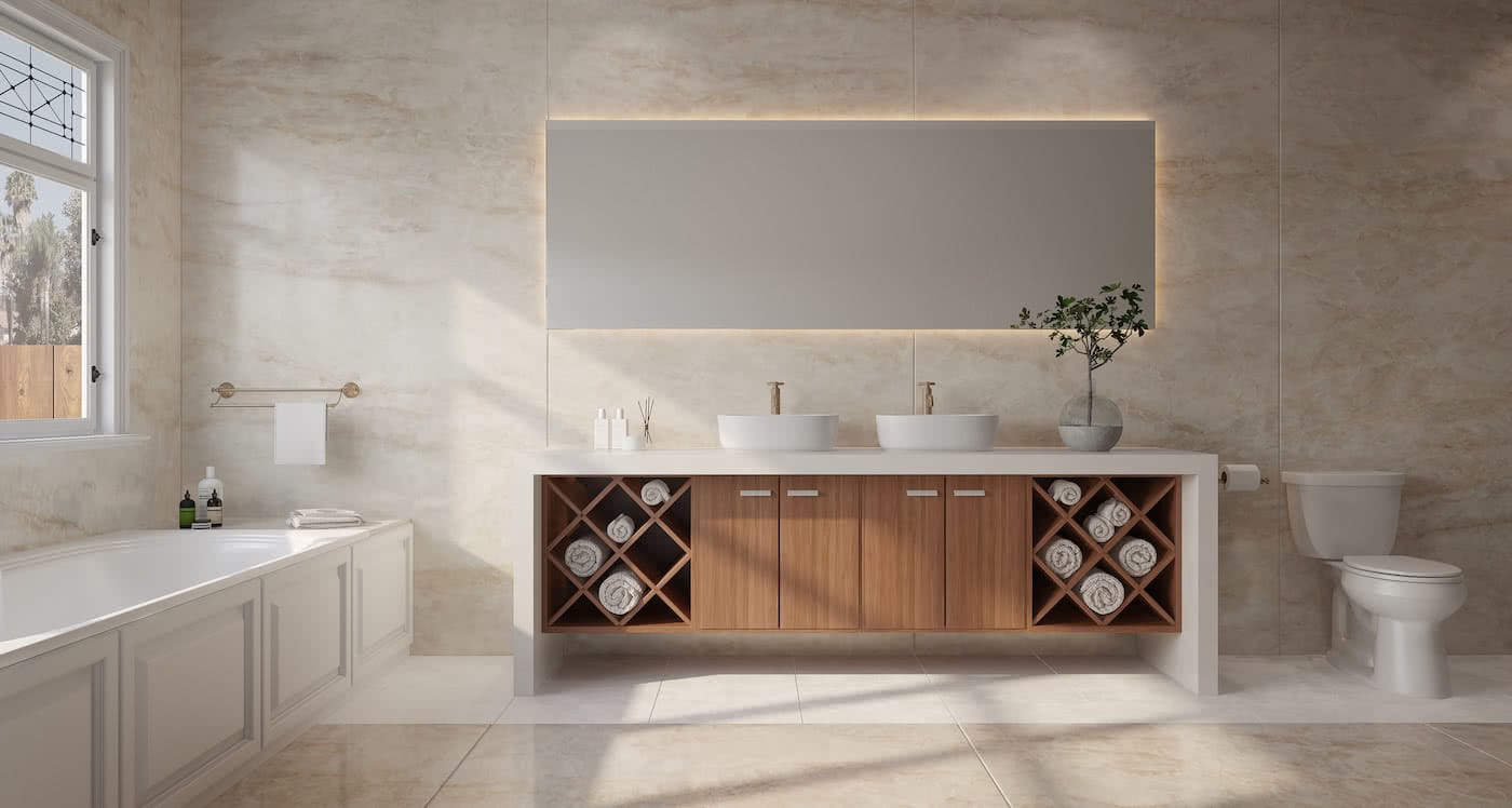 baño con mueble de madera y toallas enrolladas en su interior, encima dos lavabos, una planta y un gran espejo. el suelo y las paredes son de dekton modelo arga