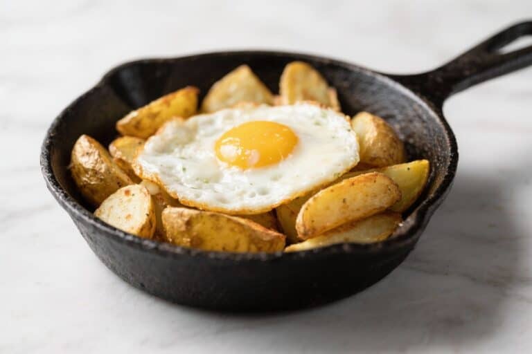 Golden Potato & Sunny-Side Egg Cast Iron Breakfast Skillet – Simple, Hearty, and Satisfying