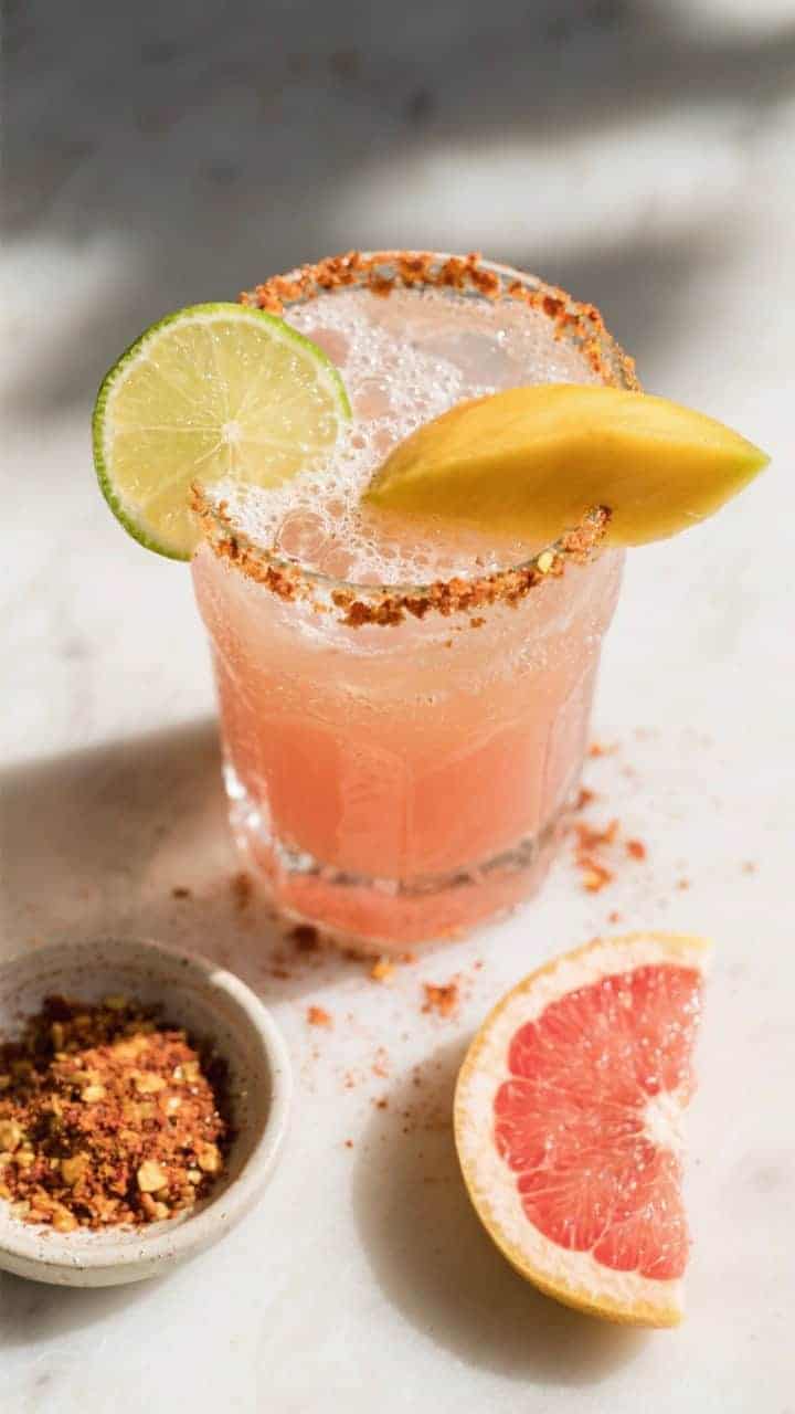 Tasty top view: Overhead shot of the finished Chili Mango Paloma topped with sparkling grapefruit so