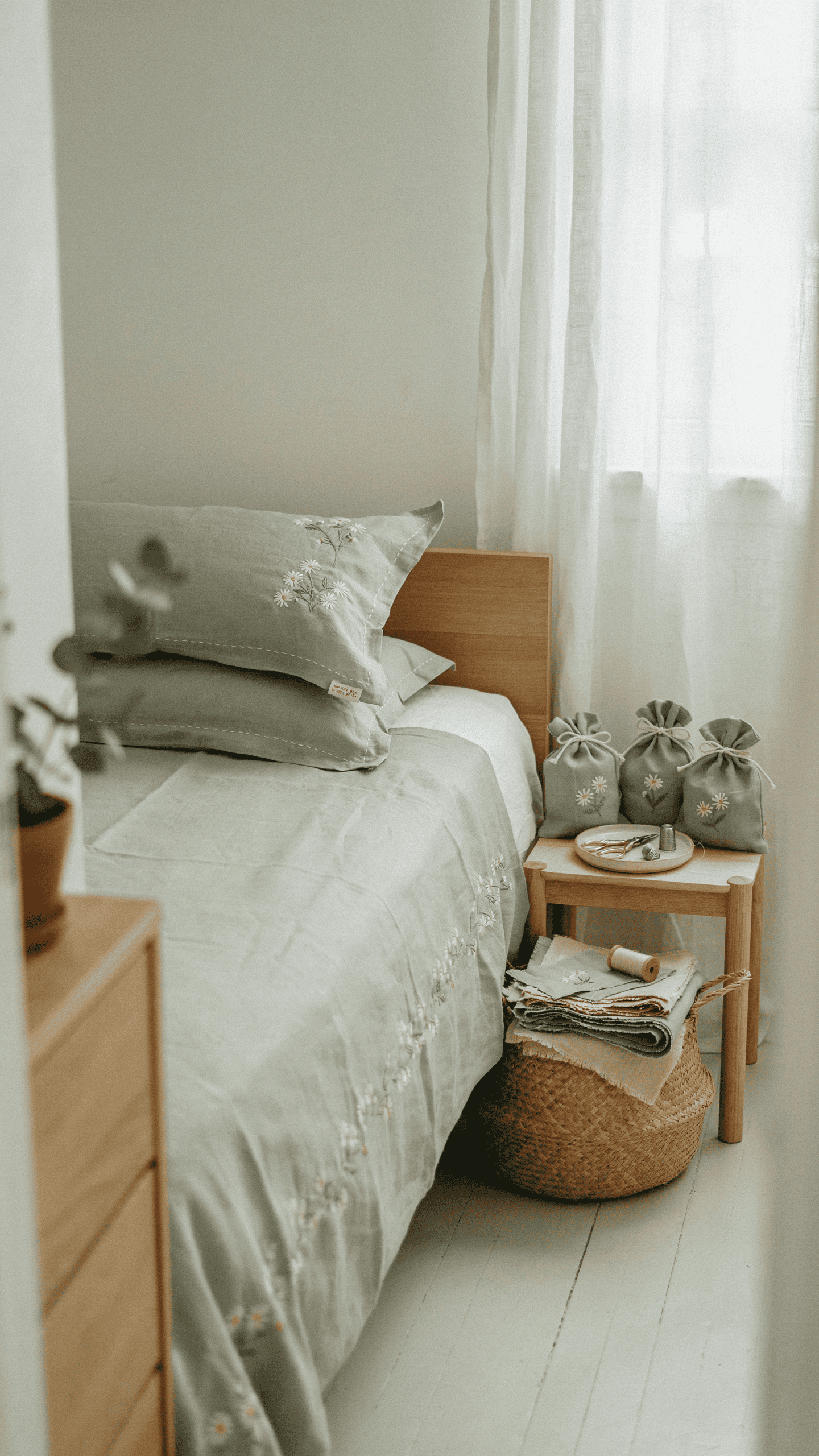 Matching handmade bedroom sewing projects including pillow covers baskets sachets and bed runner