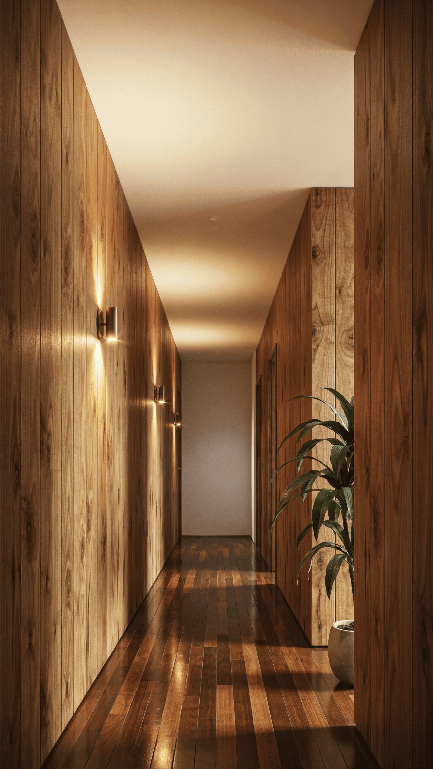 vertical wood paneling adding warmth to a narrow hallway