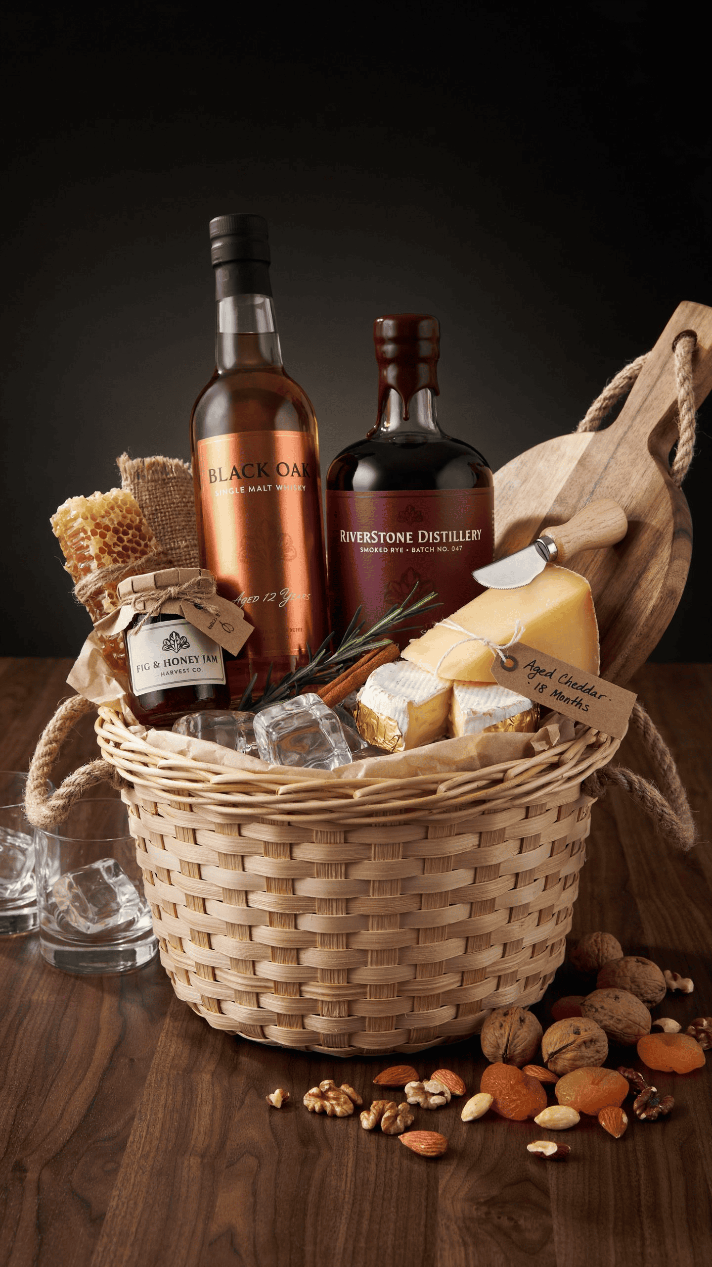 whiskey and cheese night gift basket with serving board