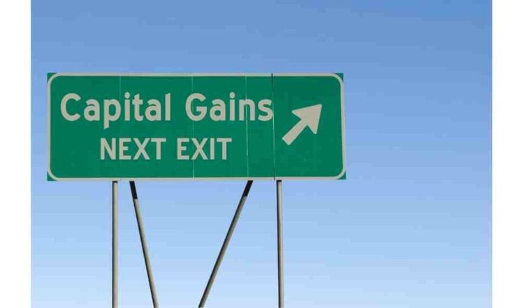green exit sign for capital gains