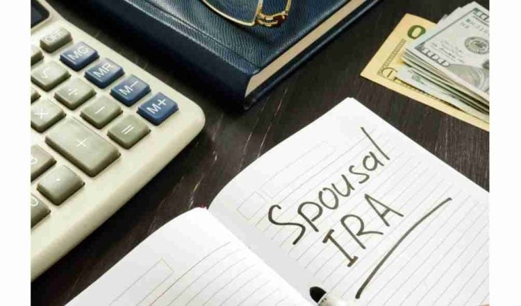 Spousal IRA inscription in the note. Retirement concept.