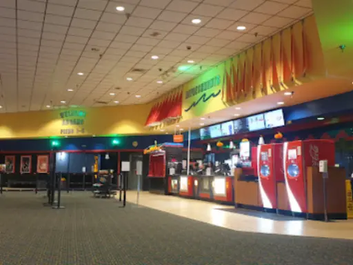 Image shows a clean, organized movie theater lobby that suggests Mid State Baths brings order and care to bathroom remodels.