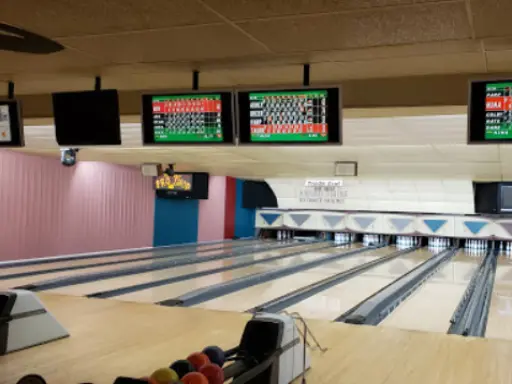 A bright, welcoming bowling alley shows how Mid State Baths can make spaces fresh and inviting.