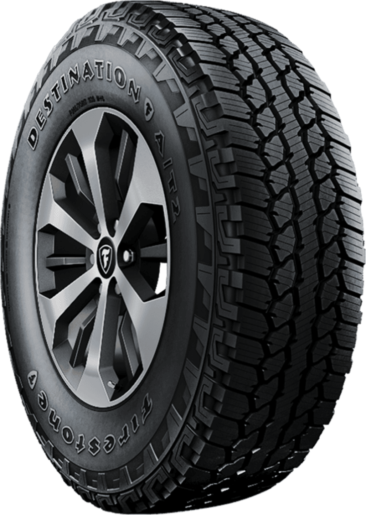 Firestone Destination AT2 tire with rugged all-terrain tread pattern.