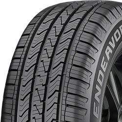 Close-up of a high-performance tire with detailed tread pattern.