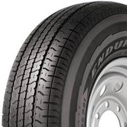 Migo Tire Corp. commercial truck tire with detailed tread pattern.