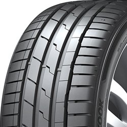 Close-up of a high-performance tire with detailed tread pattern.