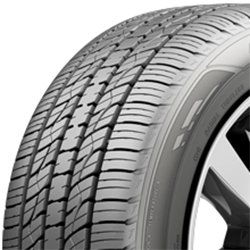 Close-up of a car tire showing detailed tread pattern for traction and durability.