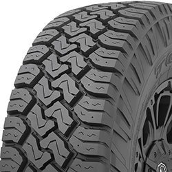 All-weather tire with rugged tread pattern for off-road and on-road use.