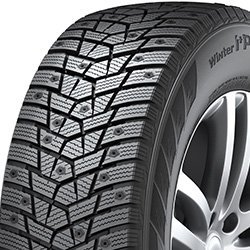 Winter tire with detailed tread pattern for snow and ice conditions.