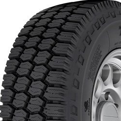 All-weather tire with rugged tread pattern for trucks and SUVs.