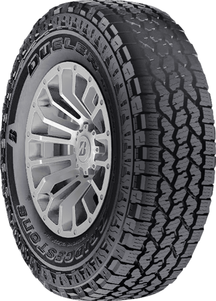 Bridgestone Dueler AT All Weather tire on a rugged vehicle.
