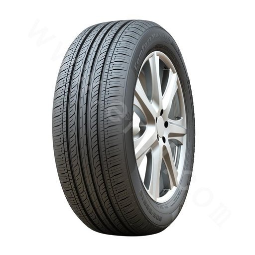 Car tire with alloy wheel on white background.