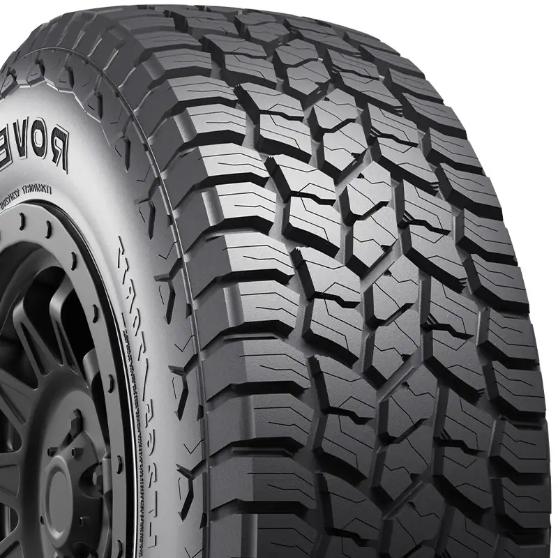 Off-road tire with rugged tread pattern for durability and traction.