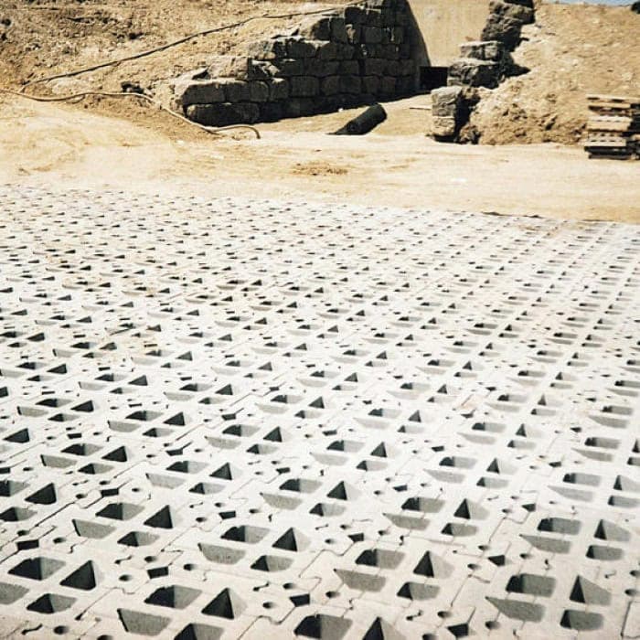 Concrete paving blocks for durable outdoor flooring installation.