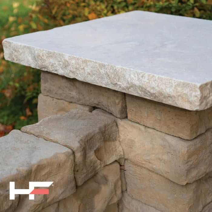 Stone pillar with flat top, ideal for website redesign and construction projects.