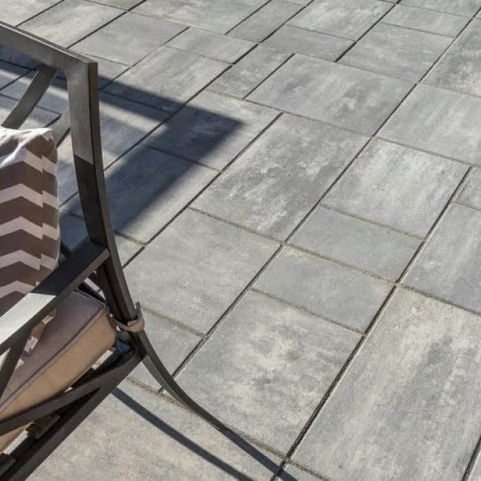 Outdoor patio featuring modern stone tile flooring for a stylish and durable surface.