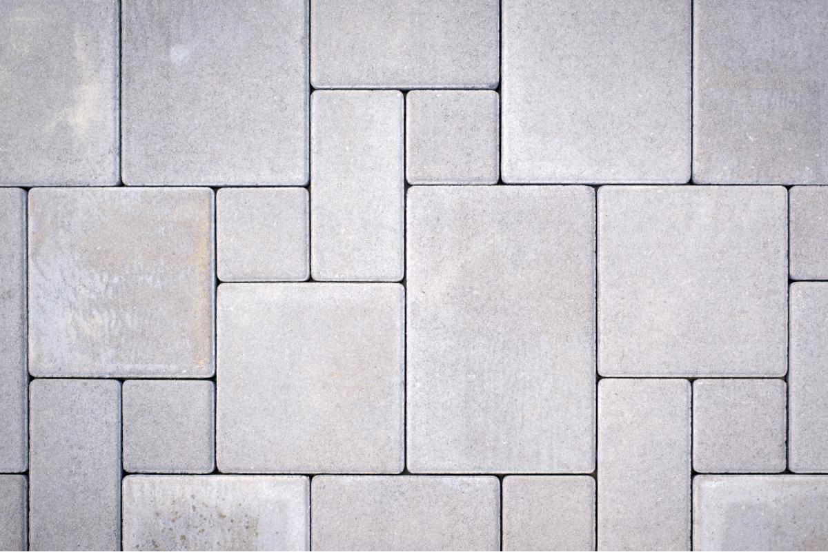 Renaming website with modern paving stones background.