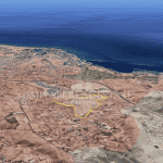 Parcela de 268.553 m² en una colina con vistas al campo de golf Meloneras, ideal para una futura construcción de lujo.