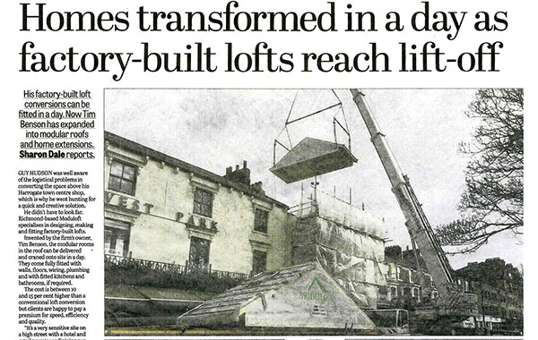 Construction of factory-built lofts on a residential building in progress.