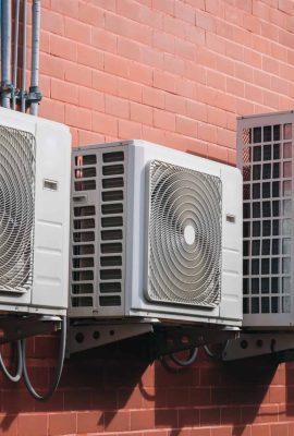 air-conditioner-compressor-installed-on-the-wall-o-2023-11-27-04-51-51-utc-scaled.jpg