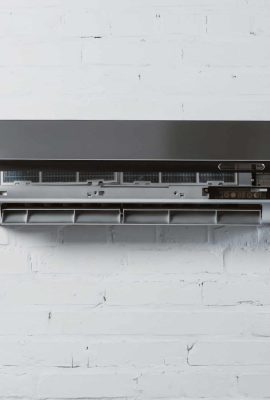 modern-air-conditioner-with-opened-front-plate-han-2023-11-27-05-17-43-utc-scaled.jpg