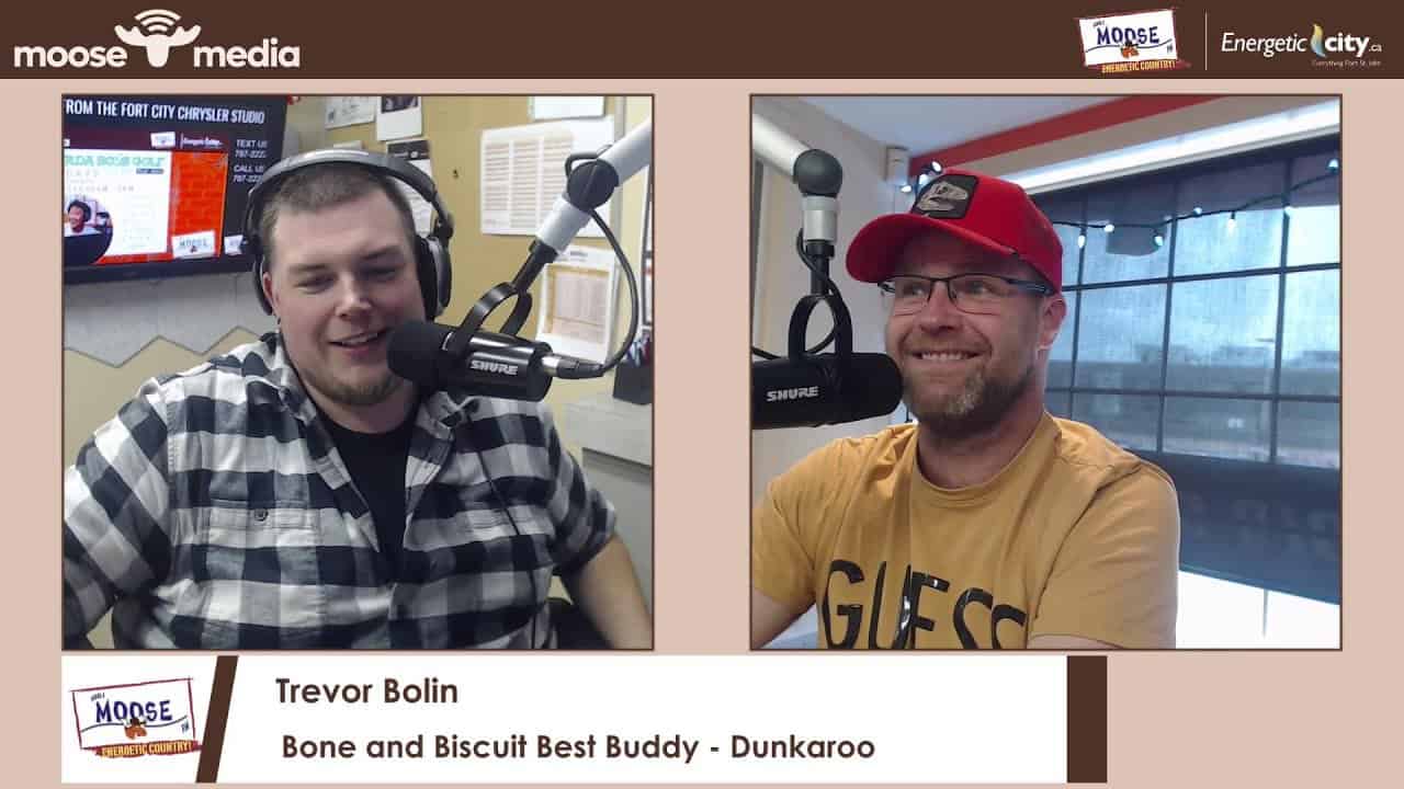 Young radio hosts recording a podcast at Moose Media studio in Fort City, highlighting local broadcasting.