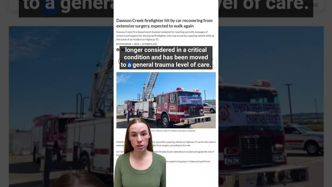 Firefighter rescue vehicle with extended ladder, Dawson Creek Fire Department.