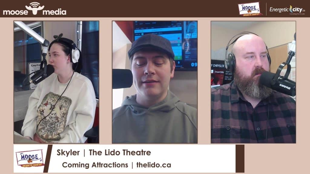 Promotional image of radio hosts discussing upcoming events at The Lido Theatre.