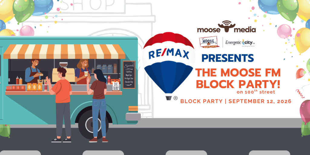 Moose FM block party with food trucks and attendees on 100th street.