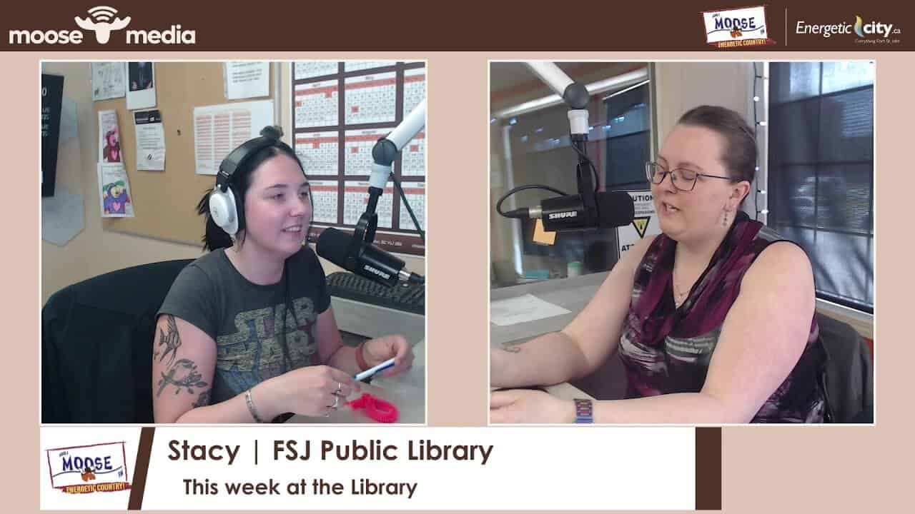 Two women in a radio studio during a library interview.