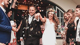 Elegant wedding celebration at Mountain Harbour venue with joyful guests and beautiful decor.