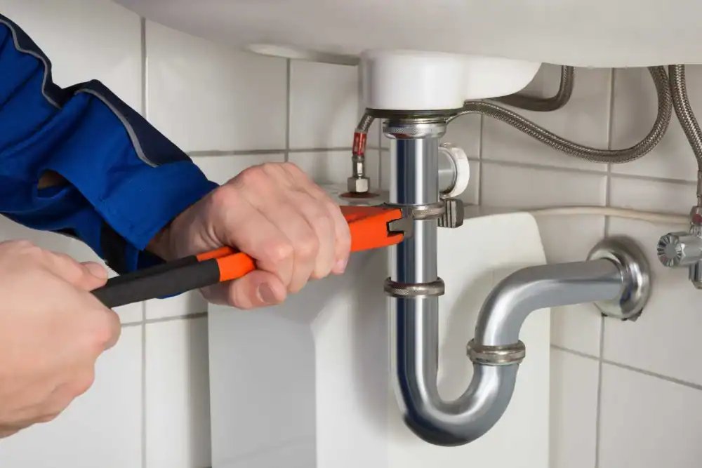 professional-plumber-fixing-a-drain