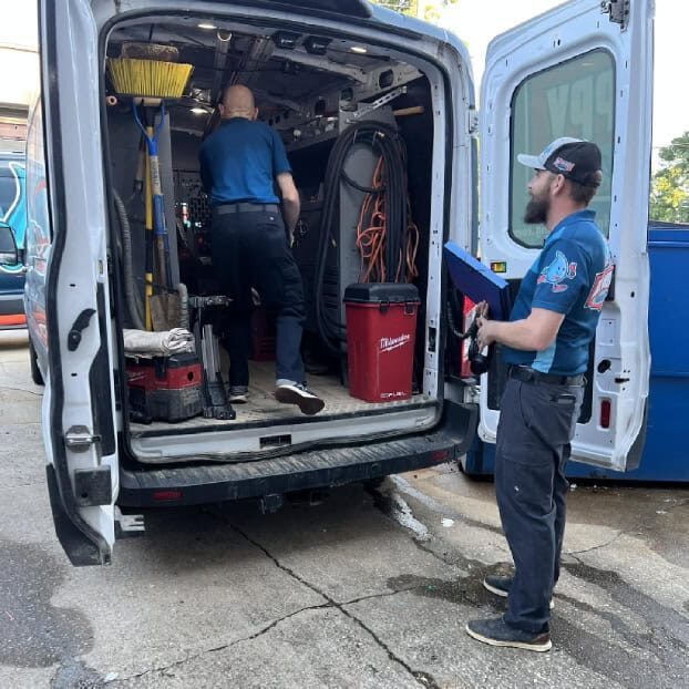 Plumber-and-a-Mr-Drippy-Plumbing-Van