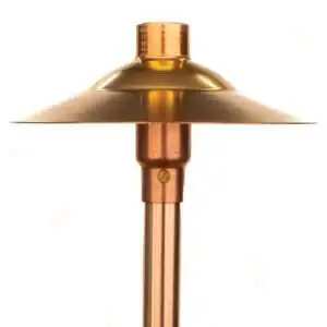Copper outdoor lighting fixture with wide shade for garden illumination.